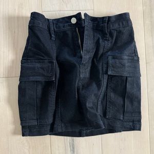 Size small, new with tags, black denim cargo mini skirt.